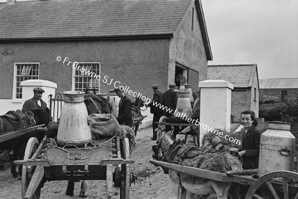 COORACLARE CREAMERY  REPLCING EMPTY CHURNS ONTO CART